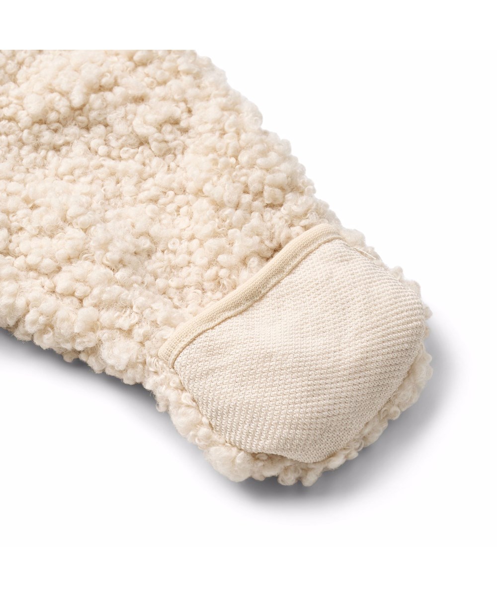 Umeko - Vanilla - Rå vit fleeceoverall för de små i återvunnen polyester med mjuk bomullsfoder.