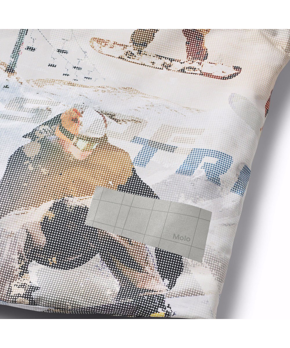 Alpine - Spin 1260 - Vind- och vattentät skidjacka för barn i återvunnen polyester med ett pixeltryck av en cool snowboardåkare i Alperna.