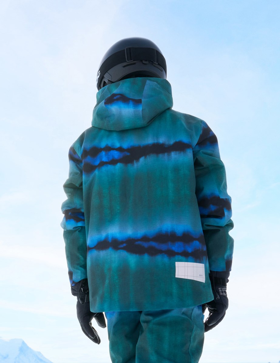 Alpine - Tie Dye Magic - Vind- och vattentät skidjacka för barn i återvunnen polyester i grön och blå tie-dye.