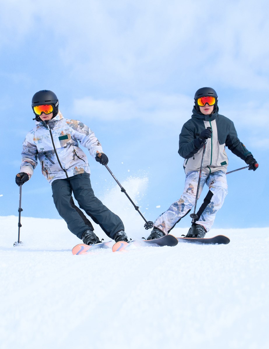 Castor - Spin 1260 - Vind- och vattentät vinterjacka för barn i återvunnen polyester med ett pixeltryck av en cool snowboardåkare i Alperna.