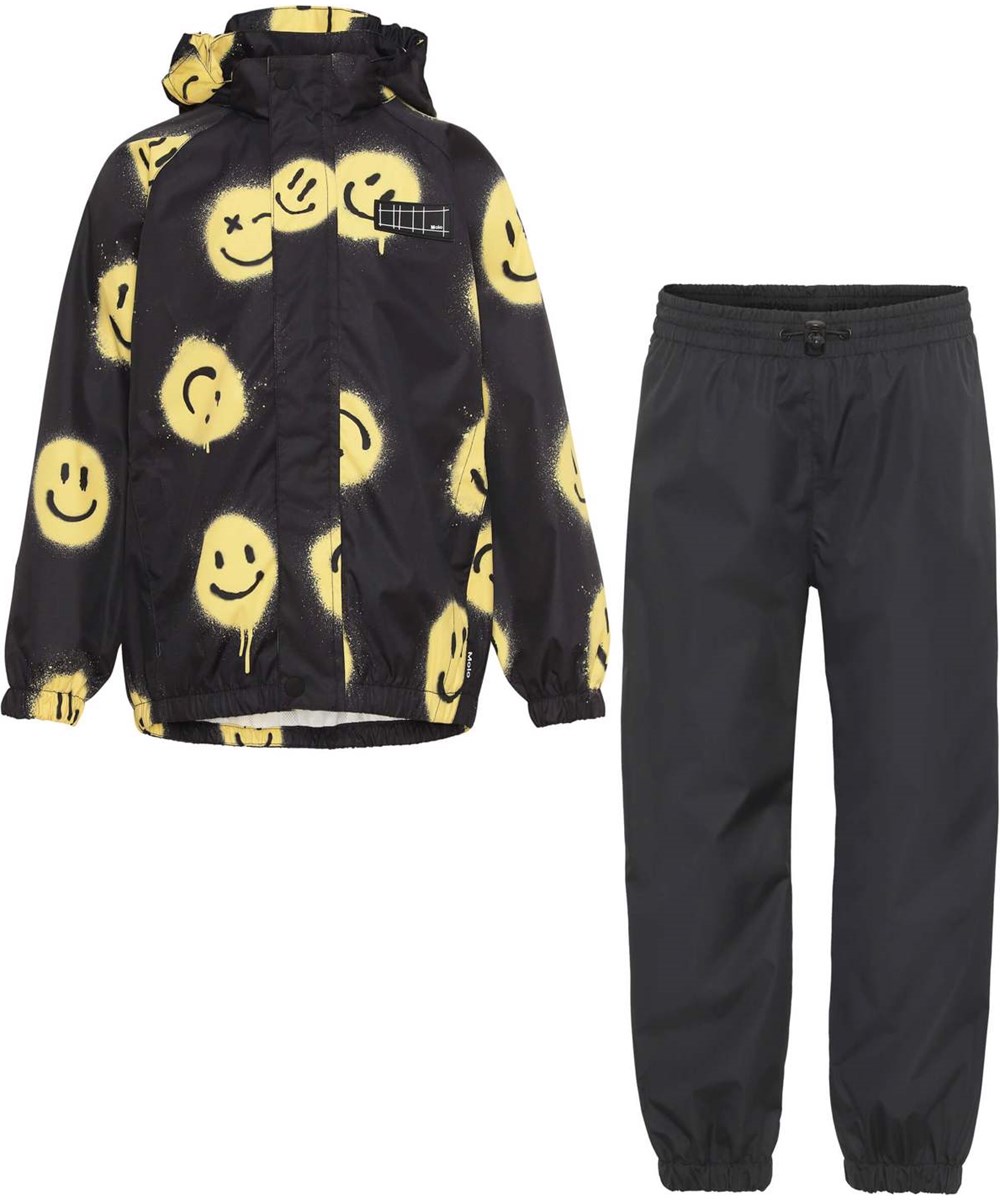 Whalley - Happy MIX - Lätt och andningsbart regnställ med smileymönster och svart.