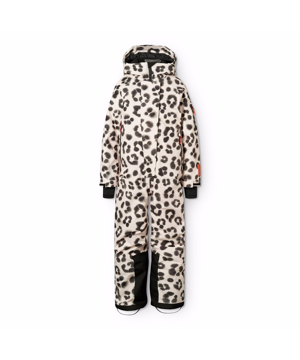 Hux - Snow Leo - Vind- och vattentät overall i ett unikt leopardmönster för en kall vinter eller skidsemester i återvunnen polyester och vadderad med 3M™ Thinsulate™.