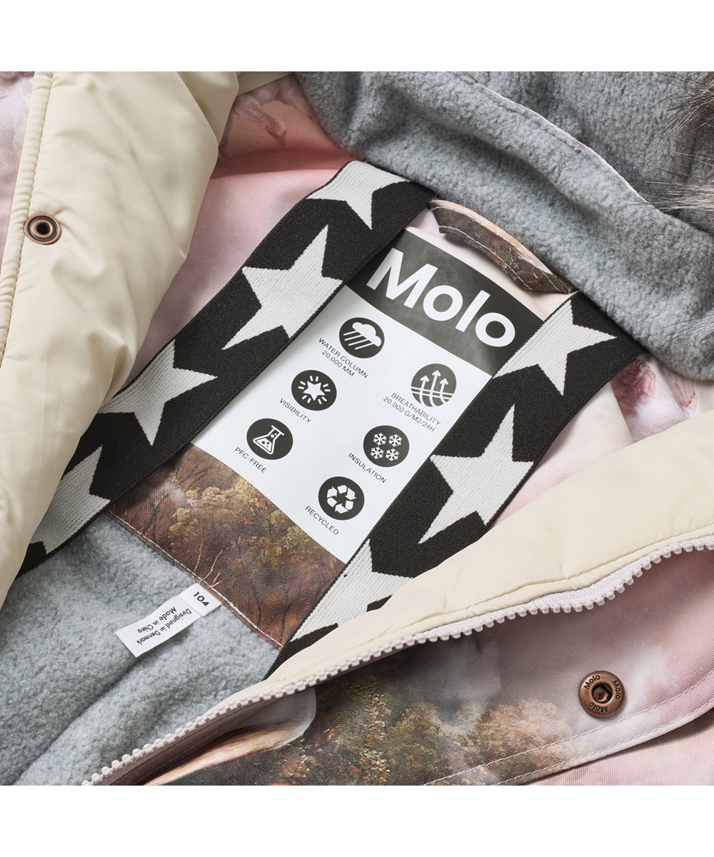 Polaris Fur - Utopia - Vind- och vattentät overall med vita pegasusar i rosa pastellfärgade moln för en kall vinter eller skidresa i återvunnen polyester och vadderad med 3M™ Thinsulate™.